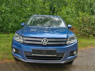 Używany VW Tiguan Exclusive 177 KM (130 kW) 2013 Niebieski SUV
