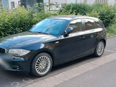Gebraucht BMW 116 116 PS (85 kW) 2011 Schwarz Kleinwagen