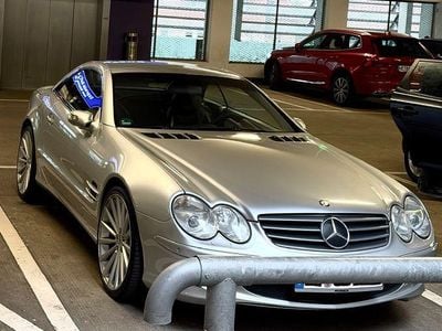 Second-hand Mercedes SL500 306 CP (225 kW) 2004 Argintiu Cabrio