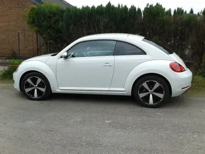 Używany VW Beetle Comfortline 105 KM (77 kW) 2014 Biały Hatchback
