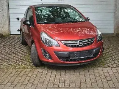 Gebraucht Opel Corsa 101 PS (74 kW) 2012 Orange Kleinwagen
