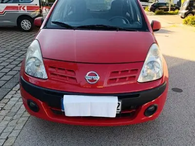 Gebraucht Nissan Pixo 68 PS (50 kW) 2009 Rot Kleinwagen
