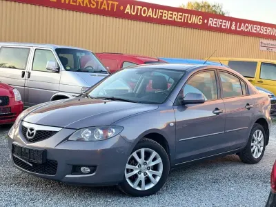 Używany Mazda 3 Active 105 KM (77 kW) 2006 Purpurowy Sedan/Limuzyna