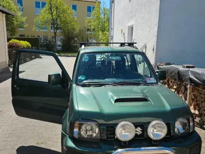 Second-hand Suzuki Jimny Comfort 86 CP (63 kW) 2013 Verde SUV