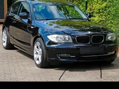 Gebraucht BMW 116 122 PS (89 kW) 2010 Schwarz Kleinwagen