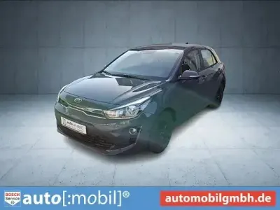 Gebraucht Kia Rio Vision 101 PS (74 kW) 2022 Prg) perennialgrau met. (grau Limousine