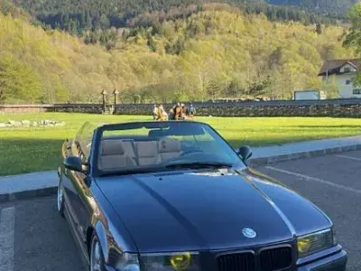 Używany BMW 320 Performance 193 KM (141 kW) 1994 Purpurowy Kabriolet