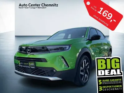 Gebraucht Opel Mokka Elegance 101 PS (74 kW) 2023 Matcha green SUV