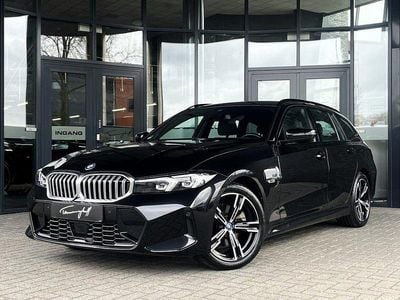 Second-hand BMW 320e M Sport 204 CP (150 kW) 2022 Negru Break