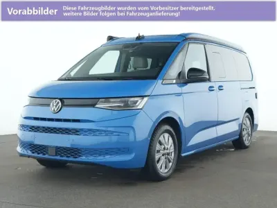 Gebraucht VW T7 Beach 245 PS (180 kW) 2025 Medium blue (metallic) Van