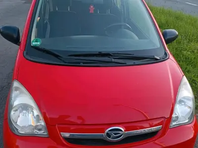 Gebraucht Daihatsu Cuore 70 PS (51 kW) 2008 Rot Kleinwagen