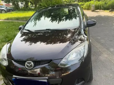 Gebraucht Mazda 2 75 PS (55 kW) 2010 Schwarz Kleinwagen