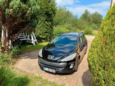 Gebraucht Peugeot 308 SW Tendance 109 PS (80 kW) 2010 Schwarz Kombi