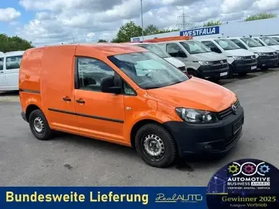 Używany VW Caddy 75 KM (55 kW) 2013 Pomarańczowy Minivan