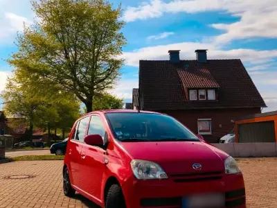 Gebraucht Daihatsu Cuore 58 PS (42 kW) 2006 Rot Kleinwagen