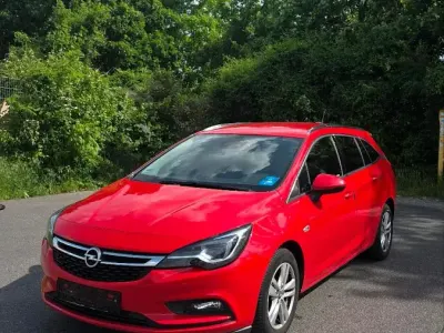 Gebraucht Opel Astra Innovation 125 PS (91 kW) 2016 Rot Kombi