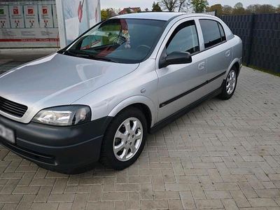 Second-hand Opel Astra 103 CP (75 kW) 2004 Argintiu Coupe