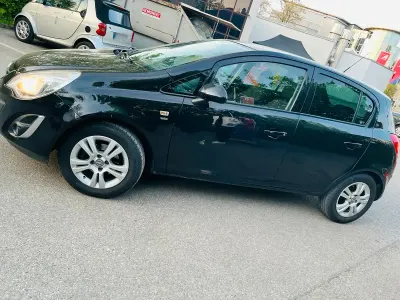 Gebraucht Opel Corsa 101 PS (74 kW) 2011 Schwarz Kleinwagen