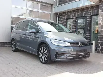 Gebraucht VW Touran Highline 150 PS (110 kW) 2024 Grau Van / Kleinbus