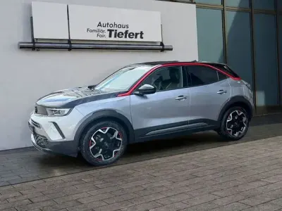 Używany Opel Mokka-e GS Line 100 kW (136 KM) 2021 Srebrny SUV