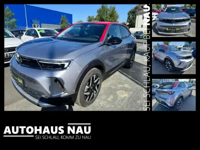 Gebraucht Opel Mokka Elegance 101 PS (74 kW) 2021 Kontrast grau/quarz silber SUV