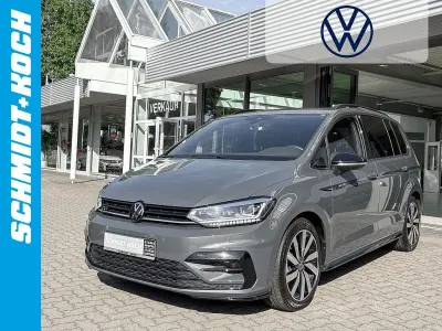 Gebraucht VW Touran Highline 150 PS (110 kW) 2025 Delfingrau (grau) Van / Kleinbus