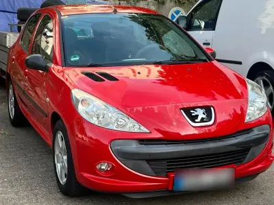 Gebraucht Peugeot 206+ 2011 Rot Kleinwagen