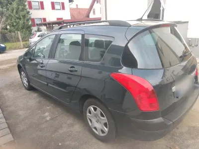 Gebraucht Peugeot 308 95 PS (69 kW) 2009 Schwarz Kombi