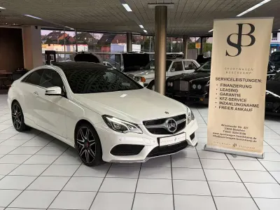 Używany Mercedes E500 AMG 408 KM (300 kW) 2014 Biały Coupe