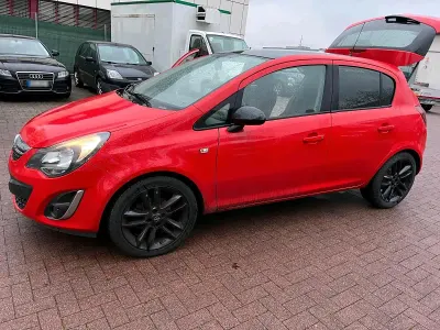 Używany Opel Corsa 100 KM (73 kW) 2014 Czerwony Hatchback