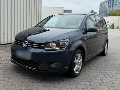 Używany VW Touran 105 KM (77 kW) 2011 Niebieski Minivan