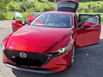 Używany Mazda 3 Selection 122 KM (89 kW) 2019 Czerwony Sedan/Limuzyna