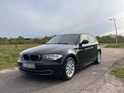 Używany BMW 116 116 KM (85 kW) 2011 Czarny Hatchback