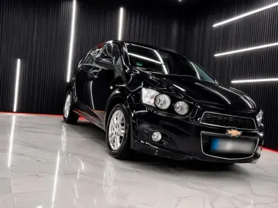 Gebraucht Chevrolet Aveo 101 PS (74 kW) 2012 Schwarz Limousine