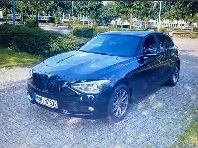 Gebraucht BMW 116 Sport Line 136 PS (100 kW) 2014 Schwarz Kleinwagen