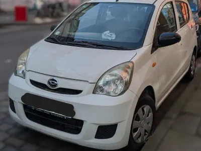 Gebraucht Daihatsu Cuore 69 PS (50 kW) 2011 Weiß Kleinwagen