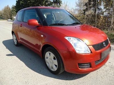 Second-hand Suzuki Swift 92 CP (67 kW) 2010 Portocaliu Hatchback