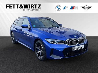 Gebraucht BMW 330e M Sport 292 PS (214 kW) 2024 Portimao blau metallic Kombi