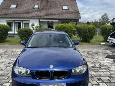 Używany BMW 116 122 KM (89 kW) 2010 Niebieski Hatchback