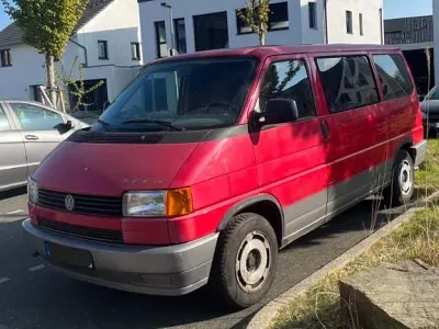 Używany VW Multivan 110 KM (80 kW) 1994 Czerwony Minivan