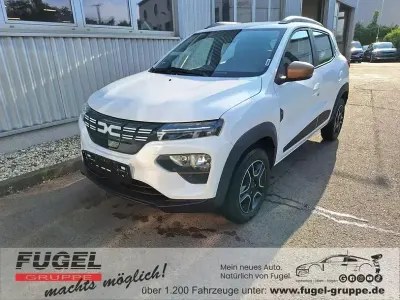 Gebraucht Dacia Spring Extreme 47 kW (65 PS) 2023 Kaolinweiß Kleinwagen