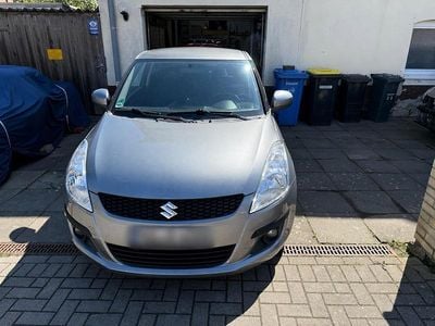 Second-hand Suzuki Swift 94 CP (69 kW) 2012 Gri Hatchback