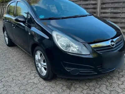 Używany Opel Corsa 74 KM (54 kW) 2010 Czarny Hatchback