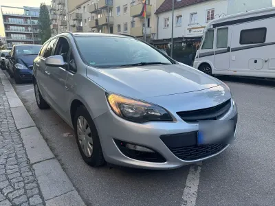 Gebraucht Opel Astra 110 PS (80 kW) 2014 Grau Kombi