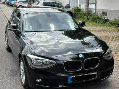Gebraucht BMW 116 116 PS (85 kW) 2012 Schwarz Kleinwagen