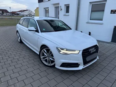Używany Audi A6 Business 272 KM (200 kW) 2015 Biały Kombi