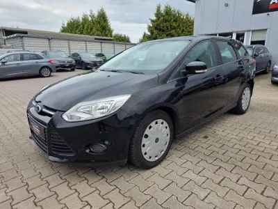 Gebraucht Ford Focus Trend 105 PS (77 kW) 2014 Pantherschwarz metallic Kombi