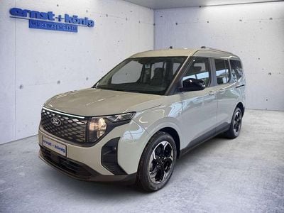 Gebraucht Ford Tourneo Courier Titanium 100 kW (136 PS) 2025 Cactus grey Van / Kleinbus