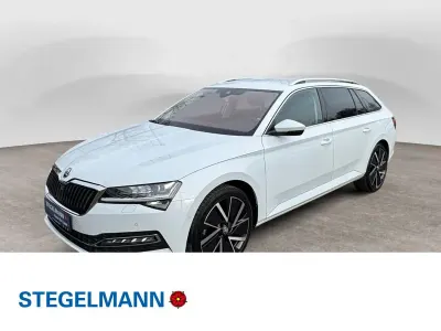 Gebraucht Skoda Superb Style 218 PS (160 kW) 2023 Moonweiss metallic Kombi