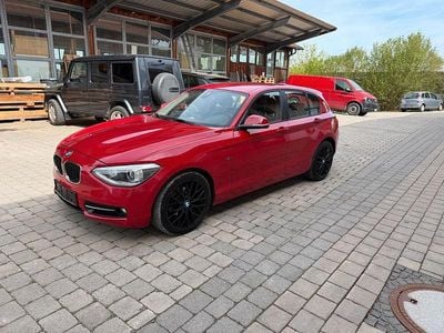 Second-hand BMW 116 Sport Line 136 CP (100 kW) 2014 Roșu Hatchback